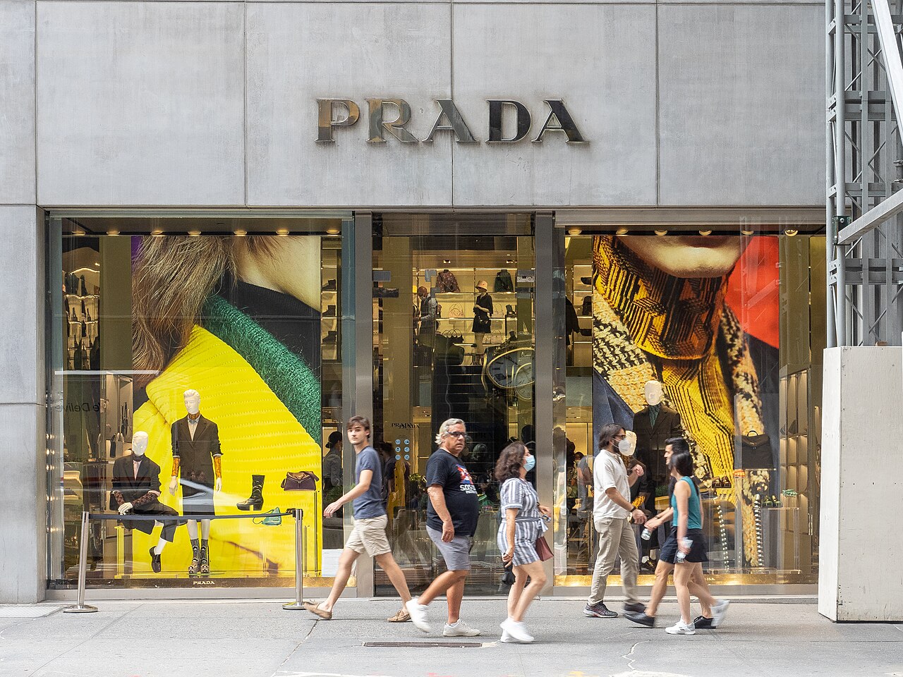 Prada storefront in New York photographed in August 2021, with mannequins visible through the windows.