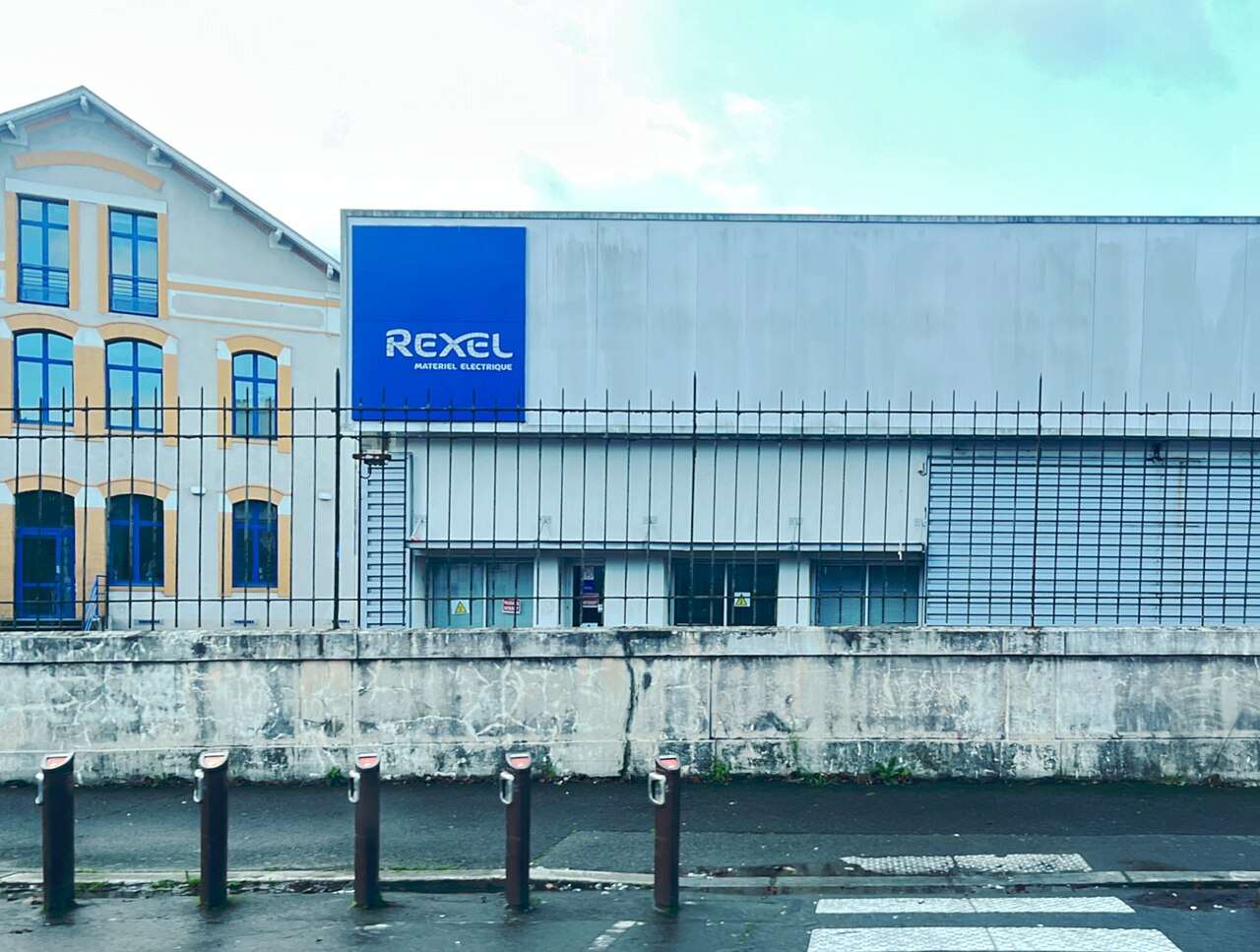 Exterior of a Rexel branch in Nantes, France, photographed in February 2024.
