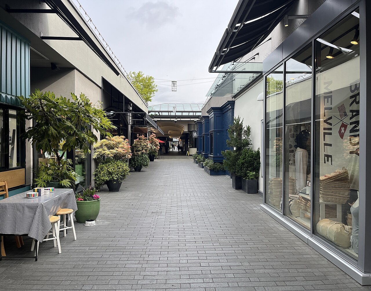 Shopfronts and pedestrian walkway at University Village in Seattle, April 2024